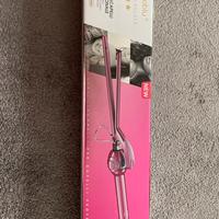 Arriccia capelli piastra