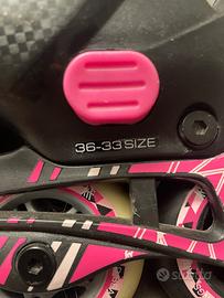 Pattini a rotelle biachi 33/36 e neri 35/38