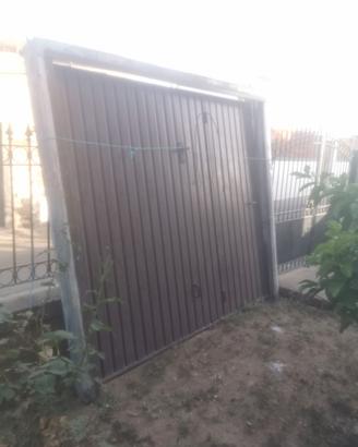 Serranda basculante zincata con porta a dx