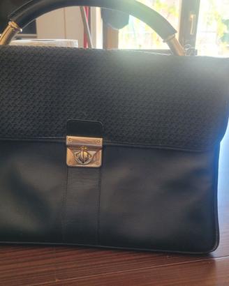 Borsa nera vintage in vera pelle manifattura fiore