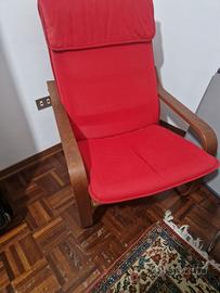 Sedia a dondolo in tessuto rosso Ikea