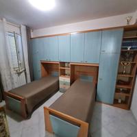 Camera doppia con armadio a ponte 