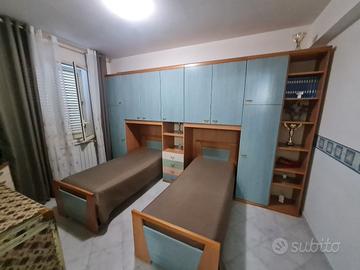 Camera doppia con armadio a ponte 