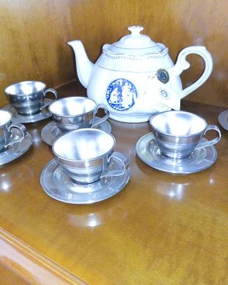 set tegliera in fine porcellanae  tazze in peltro