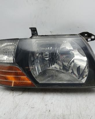 Faro ant dx MITSUBISHI PAJERO II '03