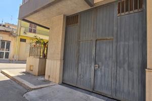 Porticato in ferro lavorato a 4 ante per garage