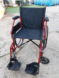 altro sedia a rotelle 