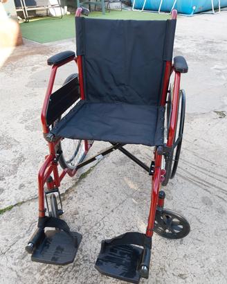 altro sedia a rotelle 