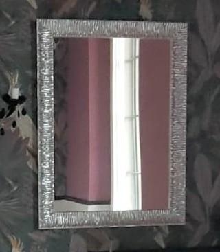 specchio da parete con cornice argento