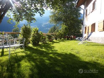 Appartamento in baita con giardino