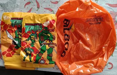 Braccioli , pinne e palla da spiaggia