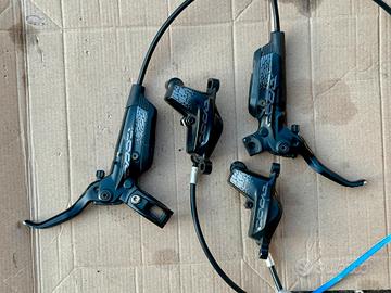 Freni SRAM Code R leve, pinze 4 pistoni, pastiglie