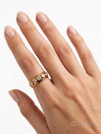 Anello oro 18kt zirconi regolabile