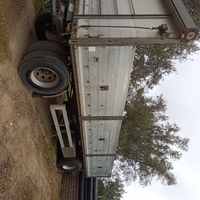 Rimorchio ribaltabile bilaterale