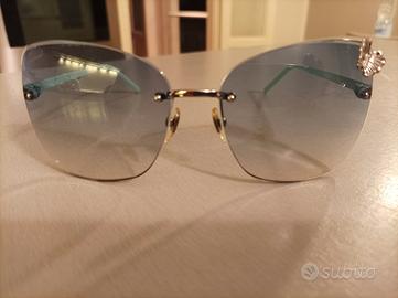 Occhiali da sole Gucci con farfalla