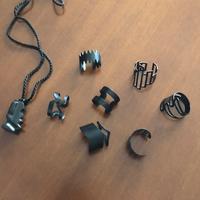 Collana c/pendente Moai Isola d.Pasqua + 7 anelli