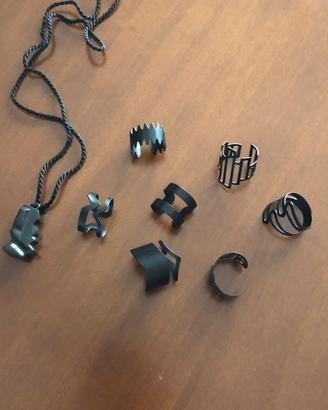 Collana c/pendente Moai Isola d.Pasqua + 7 anelli