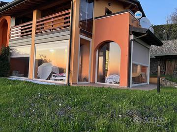 Trilocale con porticato e giardino