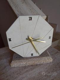 Orologio in pietra leccese e carparo