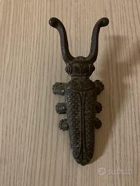 Cervo volante antico fusione in ghisa