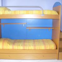 Cameretta per bambini con letto a castello