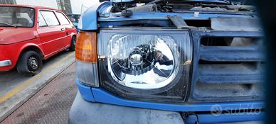 MITSUBISHI PAJERO 1998 - FARO ANTERIORE DESTRO E S