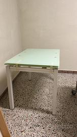 Tavolo allungabile in vetro e acciaio