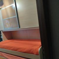 cameretta a ponte con due lettini e cassettoni 