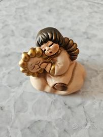 Angelo Thun su nuvola con sole