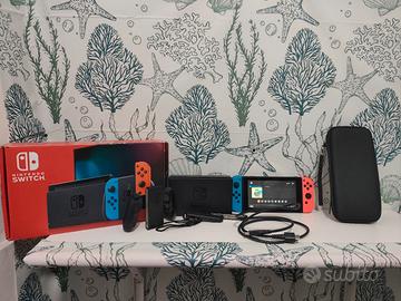Nintendo Switch Neon Blue/Red + Accessori e Custod