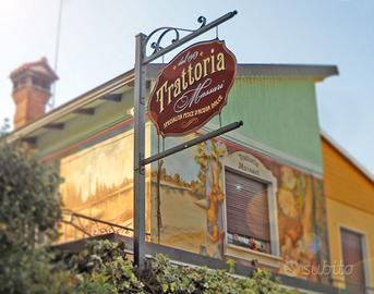 Insegna luminosa in ferro battuto