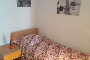 Luminosa stanza singola con balcone