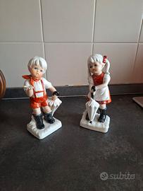 Coppia di statuine in ceramica