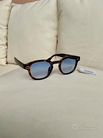 Occhiali da sole tartarugati con lenti azzurre