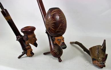 3 pipe etniche intagliate in legno