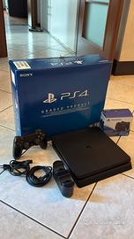 Ps4 slim 1tb + carica joystick + 2 giochi