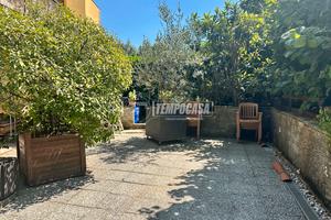 AMPIO APPARTAMENTO CON GRANDE TAVERNA, GIARDINO E