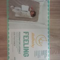 Posizionatore laterale regolabile per neonati