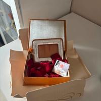 Cornice in argento in cofanetto in pelle via monte