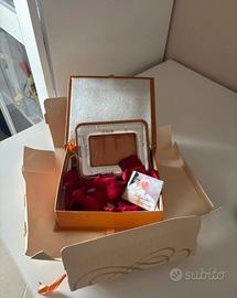 Cornice in argento in cofanetto in pelle via monte