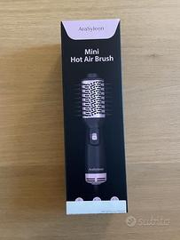 Spazzola ad aria calda per stirare ed arricciare