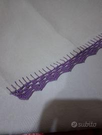 Merletto a uncinetto fatto a mano