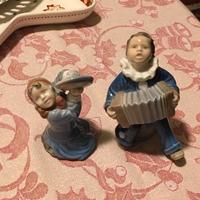 Statuine Royal Copenhagen Bimbi che suonano