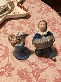 Statuine Royal Copenhagen Bimbi che suonano