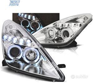 FARI TOYOTA CELICA T23 99-05 LED OCCHI ANGEL CROMA