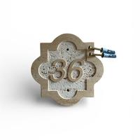 Numero civico in travertino