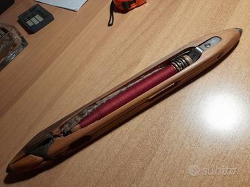 Vecchia navetta per telaio