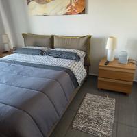 cucina stanza da letto parete attrezzata divanetto