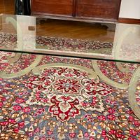 Tavolo in vetro con piedi in ferro artigianale