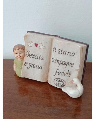 Piccolo libro con scritta incisa 